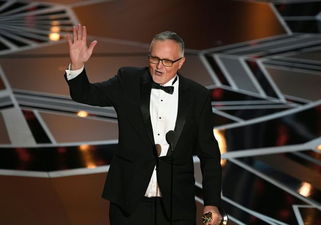Australian Film Editor Lee Smith delivers a speech after he won the Oscar for Best Film Editing for 'Dunkirk' during the 90th Annual Academy Awards