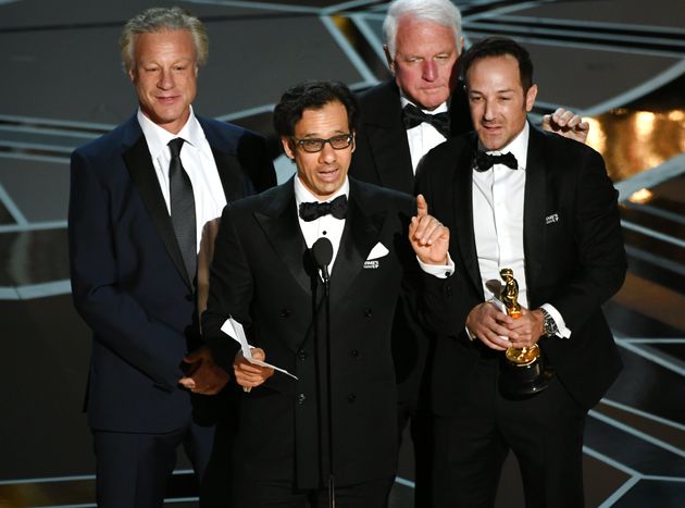 Producer David Fialkow, director Dan Cogan, producer James R. Swartz, and director Bryan Fogel accept Best Documentary Feature for 'Icarus' onstage during the 90th Annual Academy Awards 
