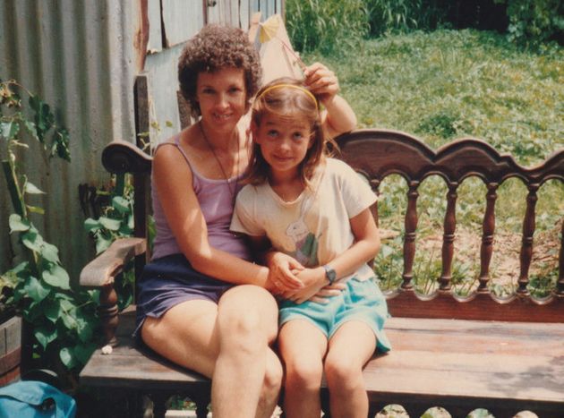 The author, just home from Girl Scouts camp, with her mother in the summer of 1987.