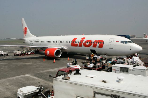 a Lion Air passenger jet is parked on the tarmac at Juanda International Airport in Surabaya, Indonesia. Indonesia's Lion Air said Monday, Oct. 29, 2018, it has lost contact with a passenger jet flying from Jakarta to an island off Sumatra. (AP Photo/Trisnadi, File)