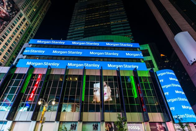 New York City, USA - July 30, 2018: Headquarters of Morgan Stanley at night on Broadway Avenue next to Times Square with large advertising screens in Manhattan in New York City, USA