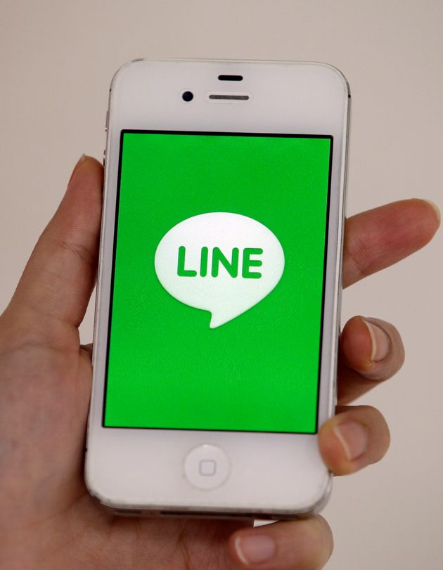 A smart phone is shown with messaging app Line in Seoul, South Korea, Wednesday, July 16, 2014. Naver Corp. said its subsidiary Line Corp. that operates a popular mobile messaging app is considering listing its shares in Tokyo or New York. Naver, South Korea's largest Internet company, said Wednesday that Line could sell shares in an initial public offering in both Japan and the U.S. (AP Photo/Lee Jin-man)