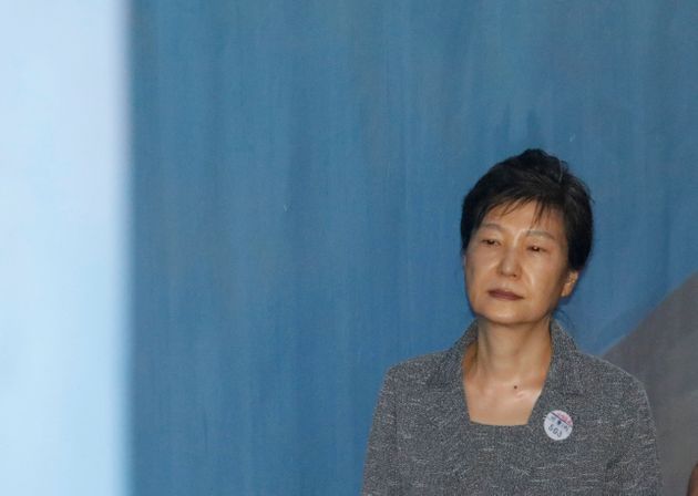 Former South Korean President Park Geun-hye arrives for her trial at the Seoul Central District Court in Seoul, South Korea, Friday, Aug. 25, 2017. Samsung heir Lee Jae-yong, the de facto leader of South Korea’s most successful business group, was implicated in the massive political scandal that culminated into Park’s ouster. (Kim Hong-Ji/Pool Photo via AP)