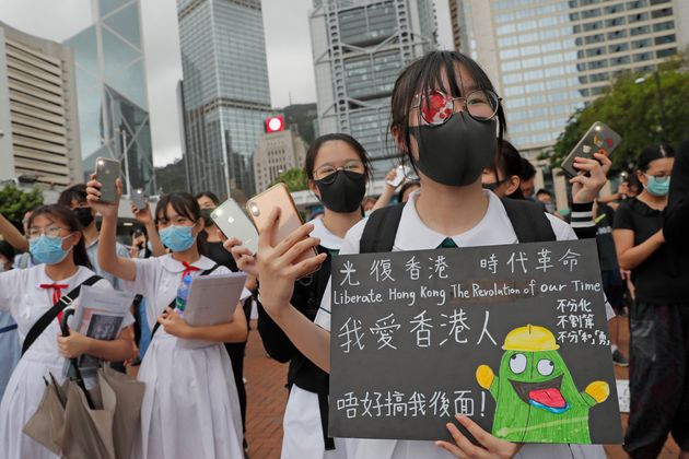 A student wears an eye patch to show solidarity with a woman injured by a police projectile during a previous protest, during a rally in Hong Kong, on Monday, Sept. 2, 2019. Hong Kong has been the scene of tense anti-government protests for nearly three months. The demonstrations began in response to a proposed extradition law and have expanded to include other grievances and demands for democracy in the semiautonomous Chinese territory. (AP Photo/Kin Cheung)