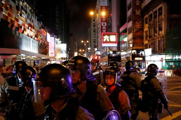 Riot police patrol streets near Mong Kok police station during an anti-extradition bill protest, in Hong Kong, China September 2, 2019. REUTERS/Tyrone Siu