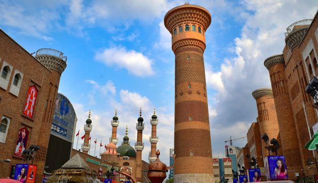Silk Road: Urumqi Grand Bazaar tower and old Tartar mosque in Muslim district - Xinjiang Autonomous Region, China