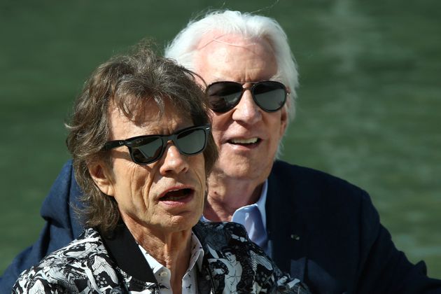 Actors Mick Jagger, left, and Donald Sutherland pose for photographers upon arrival for the photo call of the film 'The Burnt Orange Heresy' at the 76th edition of the Venice Film Festival in Venice, Italy, Saturday, Sept. 7, 2019. (Photo by Joel C Ryan/Invision/AP)