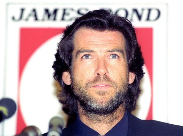 Irish actor Pierce Brosnan attends a news conference where it was announced that he will play the new James Bond, June 8, 1994. Brosnan, formerly a star of 'Reemington Steel' will play the role of 007 in the 17th Bond movie, 'Golden Eye'.  Picture taken June 8, 1994. REUTERS/Russell Boyce