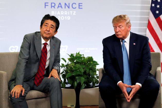 U.S. President Donald Trump and Japan's Prime Minister Shinzo Abe attend a bilateral meeting during the G7 summit in Biarritz, France, August 25, 2019. REUTERS/Carlos Barria