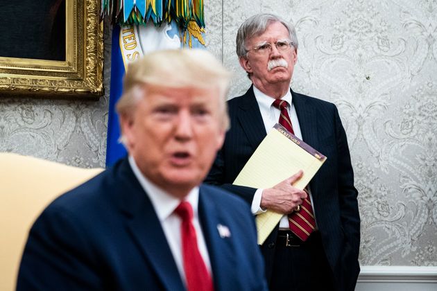 WASHINGTON, DC - JULY 18 : National Security Advisor John R. Bolton listens as President Donald J. Trump meets with Prime Minister of the Netherlands Mark Rutte in the Oval Office at the White House on Thursday, July 18th, 2019 in Washington, DC. (Photo by Jabin Botsford/The Washington Post via Getty Images)