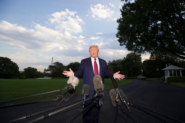 President Donald Trump speaks with reporters before departing on Marine One from the South Lawn of the White House, Thursday, Sept. 12, 2019, in Washington. Trump is en route to Baltimore.(AP Photo/Alex Brandon)
