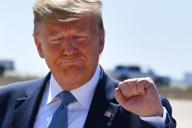 TOPSHOT - US President Donald Trump gestures after landing at San Diego International Airport in San Diego, California, on September 18, 2019. - Trump is in San Diego for a fundraiser and a border visit. (Photo by Nicholas Kamm / AFP)        (Photo credit should read NICHOLAS KAMM/AFP/Getty Images)