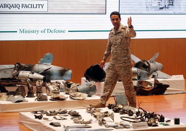 Saudi military spokesman Col. Turki al-Malki displays what he describes as an Iranian cruise missile and drones used in an attack this weekend that targeted the heart of Saudi Arabia's oil industry, during a press conference in Riyadh, Saudi Arabia, Wednesday, Sept. 18, 2019.  (AP Photo/Amr Nabil)