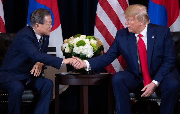 US President Donald Trump (R) shakes hands with Korean President Moon Jae-in during a meeting on the sidelines of the UN General Assembly in New York, September 23, 2019. (Photo by SAUL LOEB / AFP)        (Photo credit should read SAUL LOEB/AFP/Getty Images)