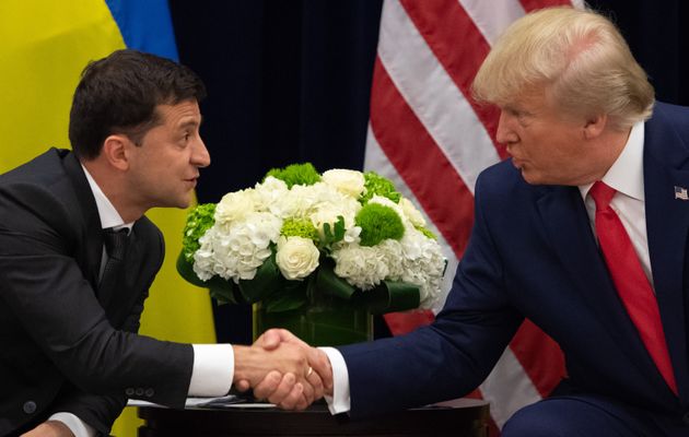 TOPSHOT - US President Donald Trump and Ukrainian President Volodymyr Zelensky shake hands during a meeting in New York on September 25, 2019, on the sidelines of the United Nations General Assembly. (Photo by SAUL LOEB / AFP)        (Photo credit should read SAUL LOEB/AFP/Getty Images)