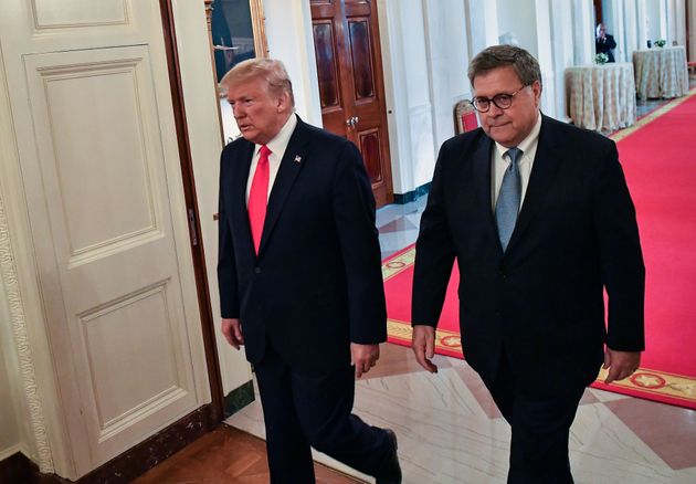US President Donald Trump (L) and Attorney General William Barr arrive to present the Medal of Valor and Heroic Commendations to officers and civilians who responded to mass shootings in Dayton, Ohio and El Paso, Texas, in the East Room of the White House in Washington, DC on September 9, 2019. (Photo by NICHOLAS KAMM / AFP)        (Photo credit should read NICHOLAS KAMM/AFP/Getty Images)
