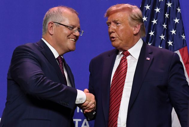 US President Donald Trump and Australian Prime Minister Scott Morrison shake hands during a visit to Pratt Industries plant opening in Wapakoneta, Ohio on September 22, 2019. (Photo by SAUL LOEB / AFP)        (Photo credit should read SAUL LOEB/AFP/Getty Images)