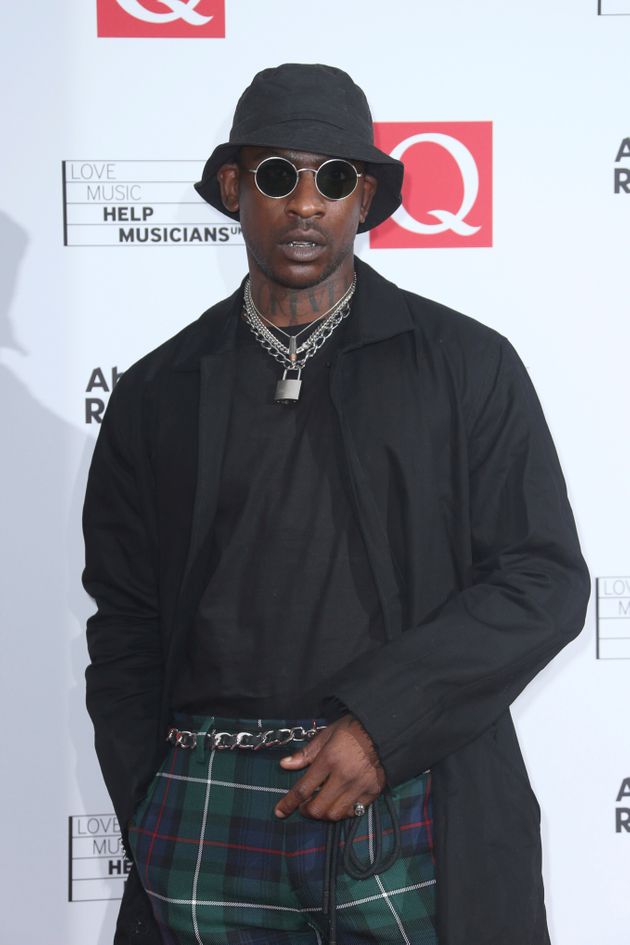 Rapper Skepta poses for photographers upon arrival at the Q Awards in London, Wednesday, Oct. 18, 2017. (Photo by Joel Ryan/Invision/AP)