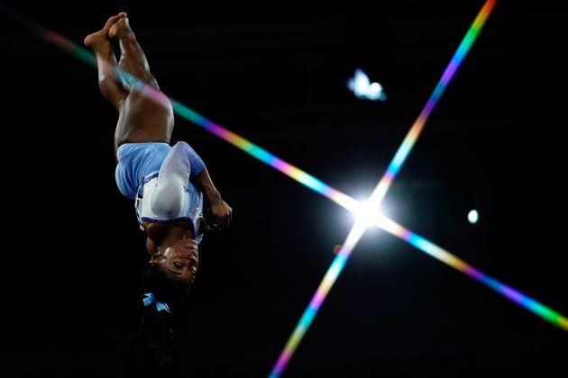 USA's Simone Biles performs during the women's qualifying session at the FIG Artistic Gymnastics World Championships at the Hanns-Martin-Schleyer-Halle in Stuttgart, southern Germany, on October 5, 2019. (Photo by Lionel BONAVENTURE / AFP) (Photo by LIONEL BONAVENTURE/AFP via Getty Images)