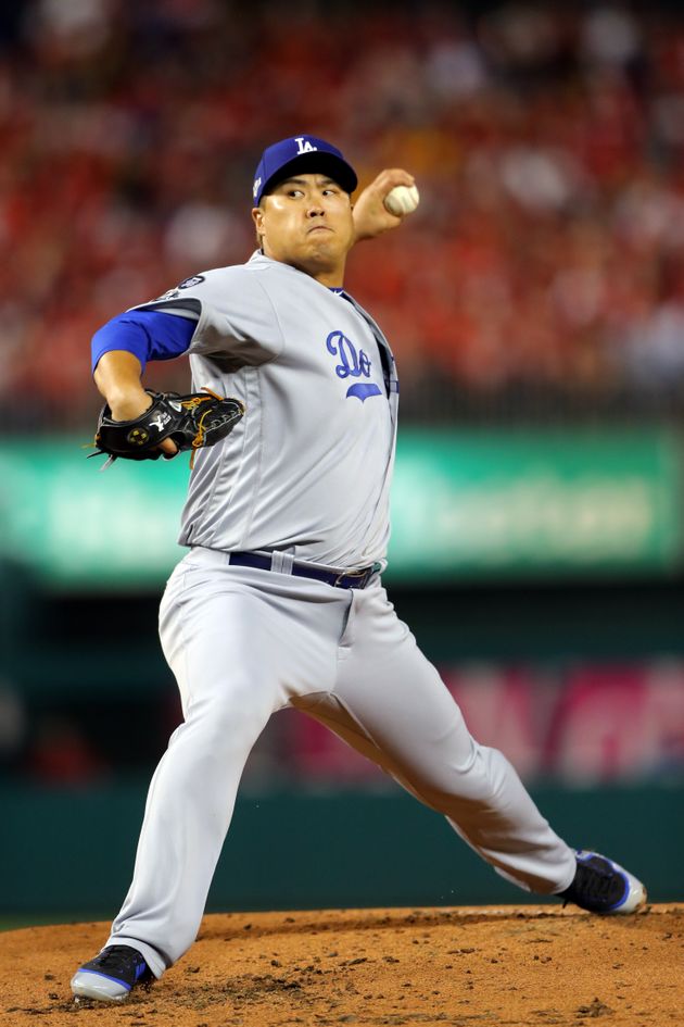 WASHINGTON, DC - OCTOBER 06:  Hyun-Jin Ryu #99 of the Los Angeles Dodgers pitches in the first inning during Game 3 of the NLDS between the Los Angeles Dodgers and the Washington Nationals at Nationals Park on Sunday, October 6, 2019 in Washington, District of Columbia. (Photo by Alex Trautwig/MLB Photos via Getty Images)