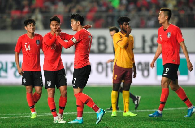 South Korea's Son Heung-min (3rd L) celebrates his goal with teammates against Sri Lanka during their World Cup 2022 Qualifying Asian zone Group H football match between South Korea and Sri Lanka in Hwaseong on October 10, 2019. (Photo by Jung Yeon-je / AFP) (Photo by JUNG YEON-JE/AFP via Getty Images)