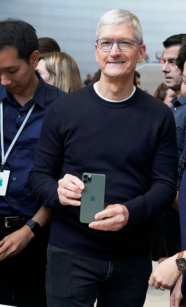 Apple CEO Tim Cook, holds the new iPhone 11 Pro Max, during an event to announce new products Tuesday, Sept. 10, 2019, in Cupertino, Calif. (AP Photo/Tony Avelar)