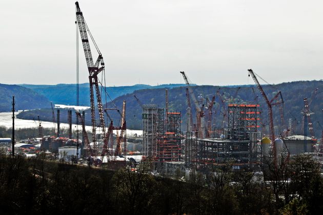FILE - This April 18, 2019 file photo shows part of a petrochemical plant being built on the banks of the Ohio River in Monaca, Pa., for the Royal Dutch Shell company. The plant, which is capable of producing 1.6 million tons of raw plastic annually, is expected to begin operations by 2021. (AP Photo/Gene J. Puskar, File)