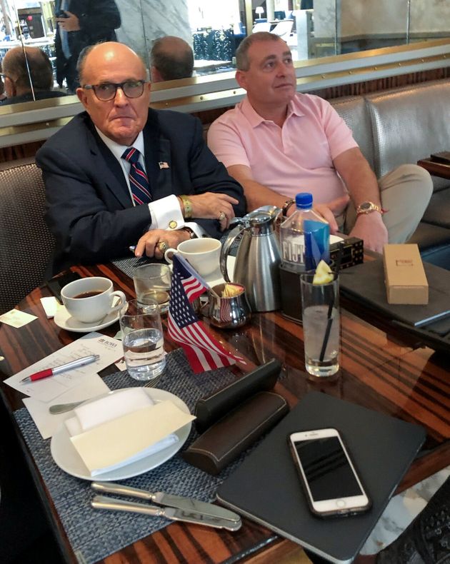 U.S. President Trump's personal lawyer Rudy Giuliani has coffee with Ukrainian-American businessman Lev Parnas at the Trump International Hotel in Washington, U.S. September 20, 2019.  REUTERS/Aram Roston