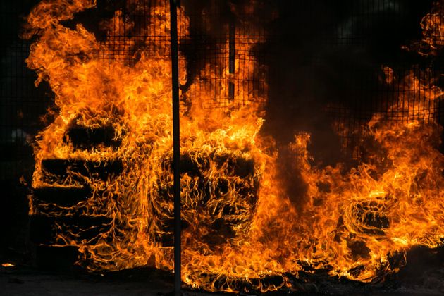 QUITO, ECUADOR - OCTOBER 12 :  Protestors sets barricades on fire near Casa de la Cultura as they clash with the police during the tenth day of protests against the government, in Quito, Ecuador, 12 October 2019.  
 (Photo by Jonatan Rosas/Anadolu Agency via Getty Images)