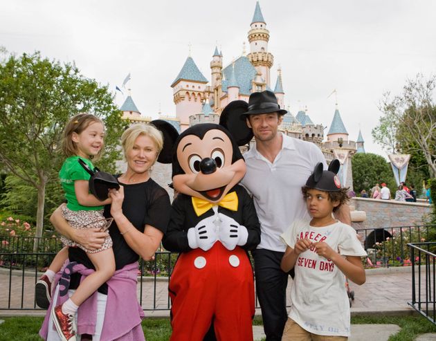 ANAHEIN, CA - APRIL 23: In this handout photo provided by Disneyland, Actor Hugh Jackman, his wife Deborra Lee Furness, and children Oscar Jackman and Ava Jackman pose with Mickey Mouse outside Sleeping Beauty Castle at Disneyland on April 23, in Anaheim, Calif. (Photo by Paul Hiffmeyer/Disneyland)