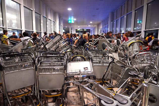BARCELONA, SPAIN - OCTOBER 14: Barricades are seen at Barcelona Airport as people take part in a protest following the sentencing of nine Catalan separatist leaders on October 14, 2019 in Barcelona, Spain. Spain's Supreme Court has sentenced nine Catalan separatist leaders to between nine and 13 years in prison over their role in the 2017 Catalan independence referendum. (Photo by Alex Caparros/Getty Images)