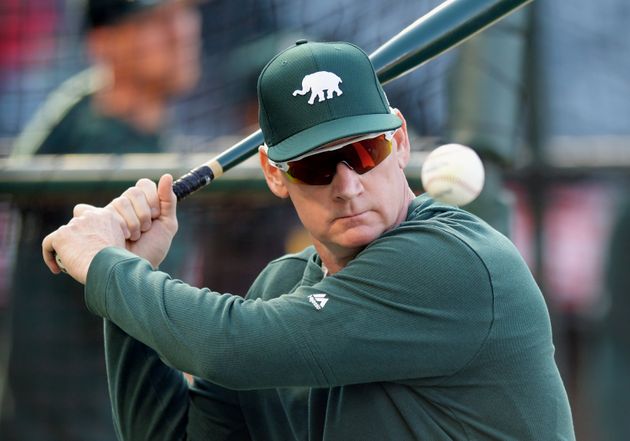ANAHEIM, CA - JUNE 04: Oakland Athletics third base coach Matt Williams (4) gets ready to hit a ball to an infielder during batting practice before a game against the Los Angeles Angels played on June 4, 2019 at Angel Stadium of Anaheim in Anaheim, CA. (Photo by John Cordes/Icon Sportswire via Getty Images)