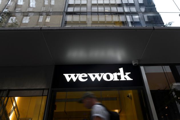 A man walks past offices run by WeWork in Philadelphia, Pennsylvania, U.S. September 30, 2019.  REUTERS/Mark Makela