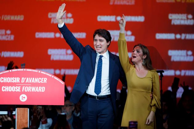 MONTREAL, QC - OCTOBER 21: Liberal Leader and Canadian Prime Minister Justin Trudeau waves alongside his wife Sophie Grégoire Trudeau after delivering his victory speech at his election night headquarters on October 21, 2019 in Montreal, Canada. Trudeau remains in power with a Minority Government. (Photo by Cole Burston/Getty Images)
