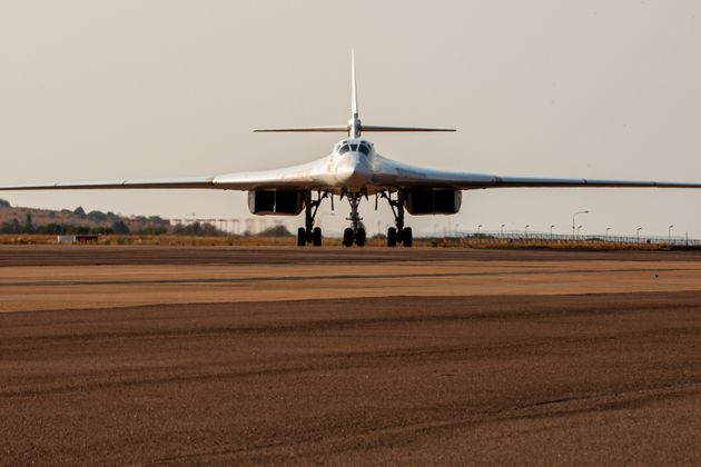 TOPSHOT - A Russian Air Force Tupolev Tu-160 'Blackjack', a supersonic variable-sweep wing heavy strategic bomber, is parked on the tarmac at the Waterkloof Air force Base in Centurion, south of Pretoria, northeastern South Africa, on October 23, 2019. (Photo by Emmanuel CROSET / AFP) (Photo by EMMANUEL CROSET/AFP via Getty Images)