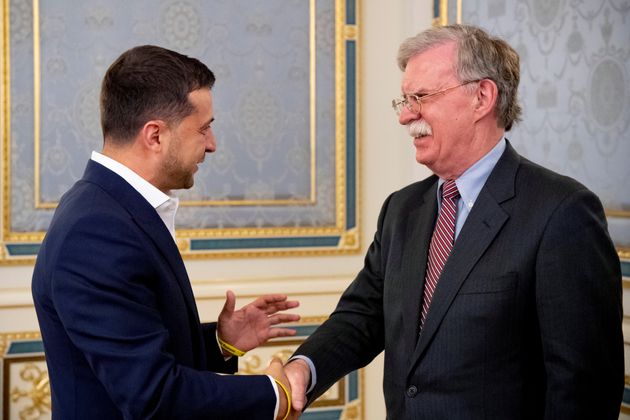 Ukrainian President Volodymyr Zelenskiy shakes hands with U.S. National Security Advisor John Bolton during a meeting in Kiev, Ukraine August 28, 2019. Ukrainian Presidential Press Service/Handout via REUTERS ATTENTION EDITORS - THIS IMAGE WAS PROVIDED BY A THIRD PARTY.