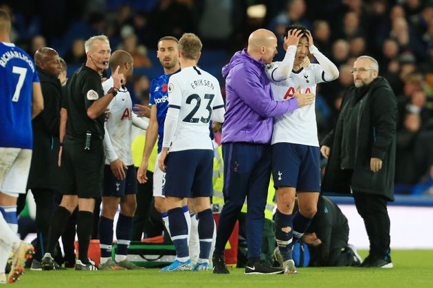 LIVERPOOL, ENGLAND - NOVEMBER 03: Son Heung-Min of Spurs is consoled following his foul on Andre Gomes of Everton during the Premier League match between Everton FC and Tottenham Hotspur at Goodison Park on November 3, 2019 in Liverpool, United Kingdom. (Photo by Simon Stacpoole/Offside/Offside via Getty Images)