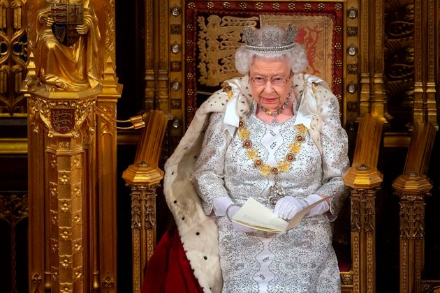 Britain's Queen Elizabeth II sits on the Sovereign's throne in the House of Lords as she delivers the Queen's Speech at the State Opening of Parliament in the Houses of Parliament in London on October 14, 2019. - The State Opening of Parliament is where Queen Elizabeth II performs her ceremonial duty of informing parliament about the government's agenda for the coming year in a Queen's Speech. (Photo by Victoria Jones / POOL / AFP) (Photo by VICTORIA JONES/POOL/AFP via Getty Images)