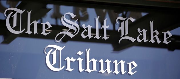 FILE- This April 20, 2016, file photo shows the Salt Lake Tribune sign in Salt Lake City. The Salt Lake Tribune says it has received approval from the IRS to convert into a nonprofit as the newspaper switches to a nontraditional model that it hopes will ensure long-term stability after years of financial struggles fueled by declines in advertising and circulation revenues.(AP Photo/Rick Bowmer, File)