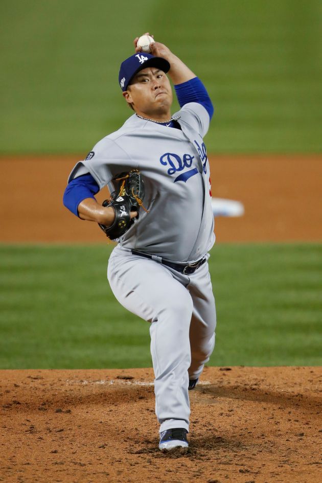 Los Angeles Dodgers starting pitcher Hyun-Jin Ryu throws to a Washington Nationals batter during the second inning in Game 3 of a baseball National League Division Series on Sunday, Oct. 6, 2019, in Washington. (AP Photo/Pablo Martinez Monsivais)