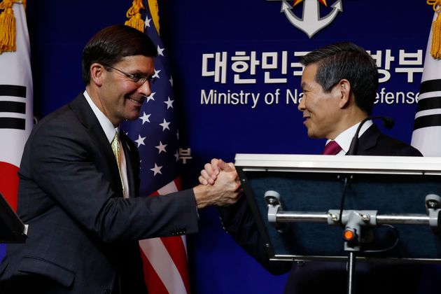 SEOUL, SOUTH KOREA - NOVEMBER 15: U.S. Defense Secretary Mark Esper (L) shakes hands with South Korean Defense Minister Jeong Kyeong-doo (R) during their press conference after the 51st Security Consultative Meeting (SCM) at Defense Ministry on November 15, 2019 in Seoul, South Korea. The Pentagon chief is visiting South Korea as a part of his tour of the Asia-Pacific regions. (Photo by Jeon Heon-Kyun-Pool/Getty Images)