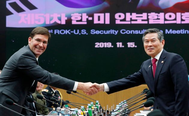 US Defense Secretary Mark Esper (L) shakes hands with South Korean Defence Minister Jeong Kyeong-doo (R) for the media prior to the 51st Security Consultative Meeting (SCM) at the Defence Ministry in Seoul on November 15, 2019. (Photo by Lee Jin-man / POOL / AFP) (Photo by LEE JIN-MAN/POOL/AFP via Getty Images)