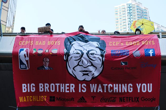 HONG KONG, CHINA - 2019/10/20: Protesters hold up a banner with Xi Jinping face on it during the demonstration.
Shortly after an unauthorised march ended, the conflicts between police and the protesters continued, forcing police to use water cannons and tear gas to disperse protesters. With the anti-government movement entering its fourth month and keep on escalating, many China-linked stores and business are being vandalised and arson. (Photo by Keith Tsuji/SOPA Images/LightRocket via Getty Images)