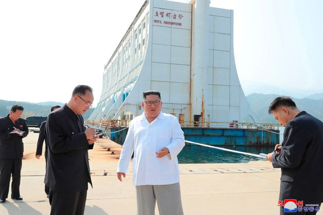 FILE - In this undated file photo provided on Wednesday, Oct. 23, 2019, by the North Korean government, North Korean leader Kim Jong Un, center, visits the Diamond Mountain resort in Kumgang, North Korea. North Korea on Tuesday, Oct. 29, 2019, rejected South Korea's request for working-level talks to discuss the possible demolition of South Korean-made hotels and other facilities at the North's Diamond Mountain resort that North Korean leader Kim Jong Un wants removed. Korean language watermark on image as provided by source reads "KCNA" which is the abbreviation for Korean Central News Agency. (Korean Central News Agency/Korea News Service via AP, File)