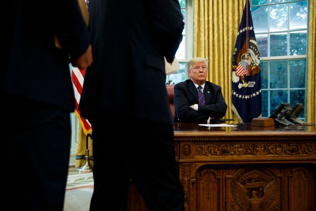 President Donald Trump sits at his desk after talking with Mexican President Enrique Pena Nieto on the phone in the Oval Office of the White House, Monday, Aug. 27, 2018, in Washington. Trump is announcing a trade 'understanding' with Mexico that could lead to an overhaul of the North American Free Trade Agreement.
Trump made the announcement Monday in the Oval Office, with Mexican President Enrique Pena Nieto joining by speakerphone. (AP Photo/Evan Vucci)