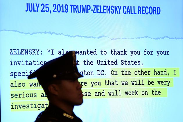A quote is displayed on a monitor as Jennifer Williams, an aide to Vice President Mike Pence, and National Security Council aide Lt. Col. Alexander Vindman, testify before the House Intelligence Committee on Capitol Hill in Washington, Tuesday, Nov. 19, 2019, during a public impeachment hearing of President Donald Trump's efforts to tie U.S. aid for Ukraine to investigations of his political opponents. (AP Photo/Susan Walsh)