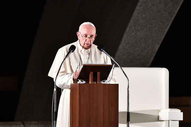 Pope Francis speaks by the cenotaph in memory of those killed in the 1945 atomic bombing during an event held at the Peace Memorial Park in Hiroshima on November 24, 2019. - Pope Francis on November 24 described the use of nuclear bombs as 'a crime', as he took his appeal for an end to atomic weapons to Hiroshima in an emotional meeting with survivors. (Photo by Vincenzo PINTO / AFP) (Photo by VINCENZO PINTO/AFP via Getty Images)