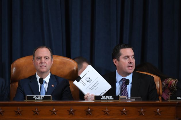 WASHINGTON, DC - NOVEMBER 21: House Intelligence Committee chair, Adam Schiff (D-CA) looks on as U.S. Representative Devin Nunes (R-CA) speaks as David A. Holmes, Department of State political counselor for the United States Embassy in Kyiv, Ukraine and Dr. Fiona Hill, former National Security Council senior director for Europe and Russia appear before the House Intelligence Committee during an impeachment inquiry hearing at the Longworth House Office Building on Thursday November 21, 2019 in Washington, DC. (Pool Photo by Matt McClain/The Washington Post via Getty Images)