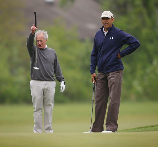 President Barack Obama, right, with Sen. Bob Corker, R-Tenn., left, on the first hole of the golf course at Andrews Air Force Base, Monday, May 6, 2013. (AP Photo/Pablo Martinez Monsivais)