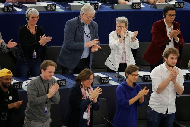 Members of the European Parliament react after a vote during a voting session in Strasbourg, France, November 28, 2019. MEP's voted on thursday on a 'climate emergency' resolution ahead of a United Nations climate conference in Madrid and on the European Parliament stance for the UN COP25 climate conference.    REUTERS/Vincent Kessler